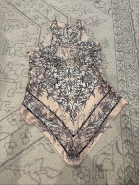 Amazing Y2K silk/ spandex Caché halter top with handkerchief hem, size M